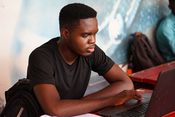 Student working on a laptop